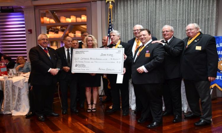 Presentation of Check to Catholic Health Services